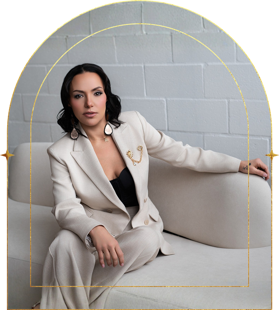Angie-Pepper O’Bomsawin, seated arch portrait