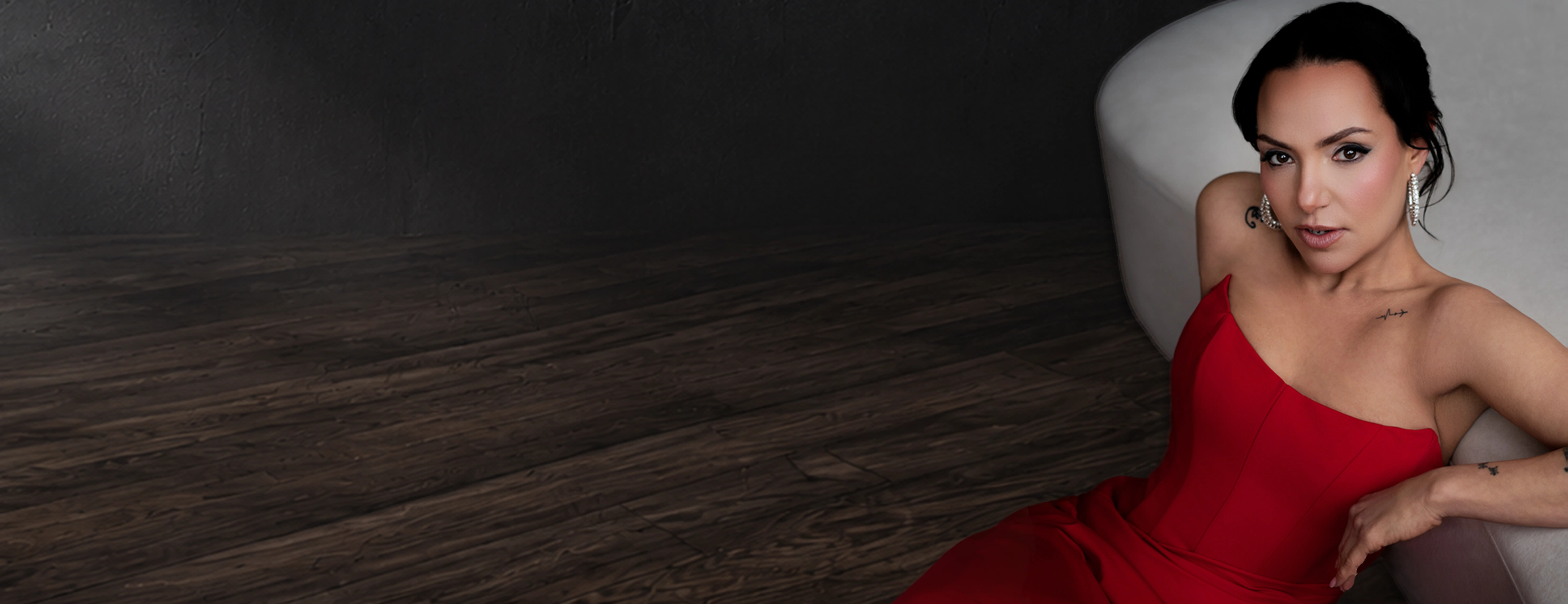Angie-Pepper O’Bomsawin in a red dress